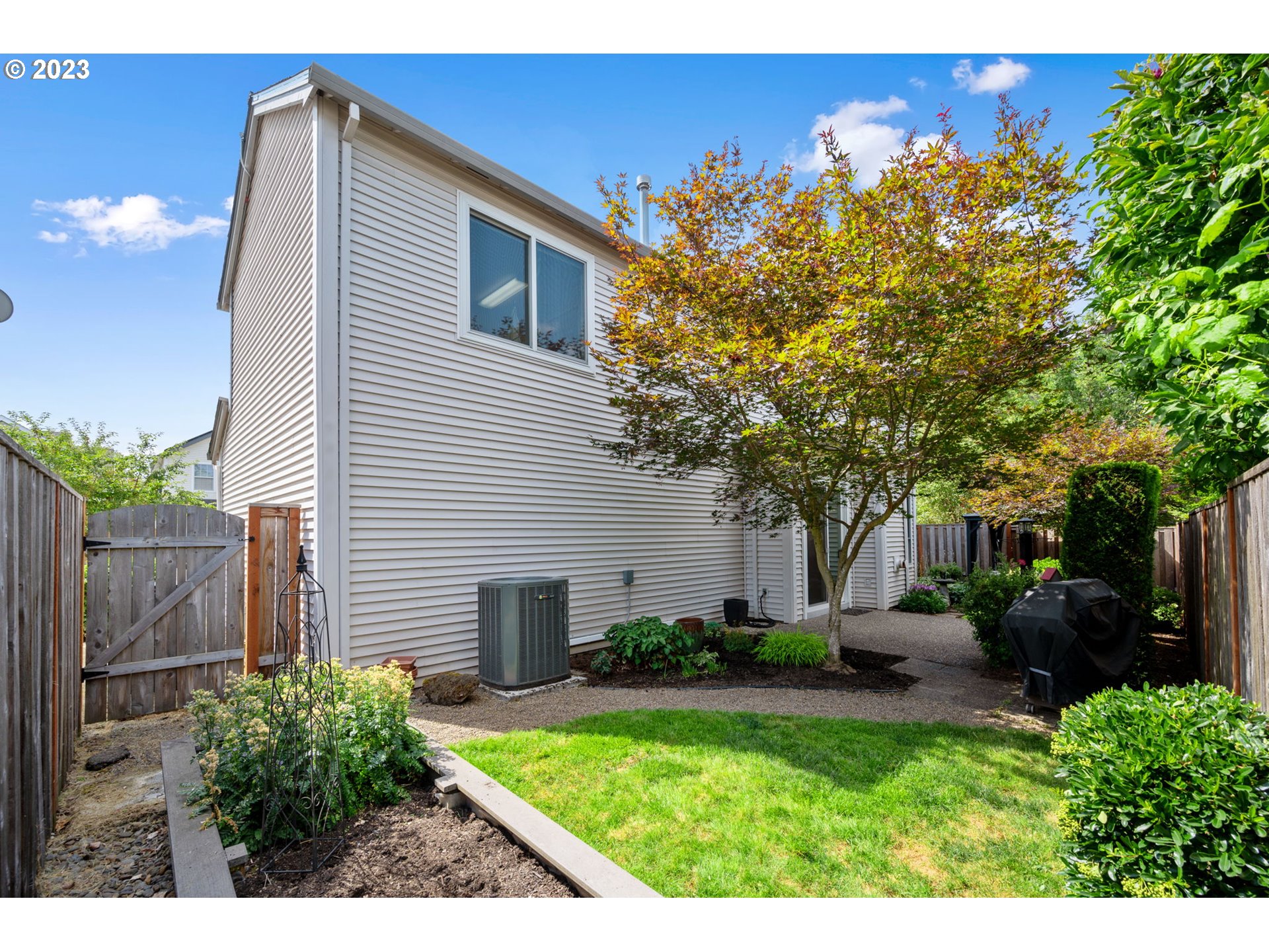 8627 Southwest Lodi Lane Portland, OR 97224 - Photo 39 of 41 a view front of house with backyard and sitting area
