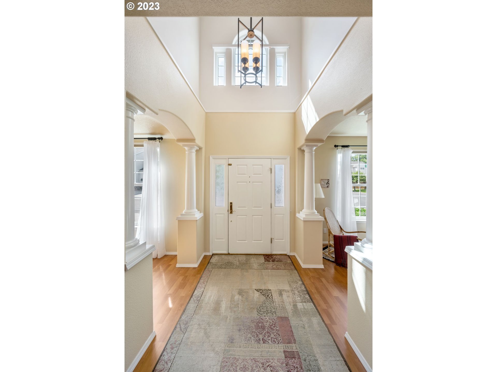 8627 Southwest Lodi Lane Portland, OR 97224 - Photo 6 of 41 a view of a hallway with a white walls