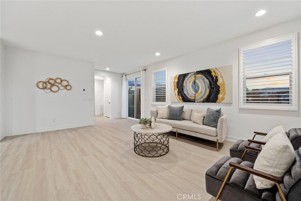 131 Restore Irvine, CA 92618 - Photo 13 of 43 a living room with furniture and a window