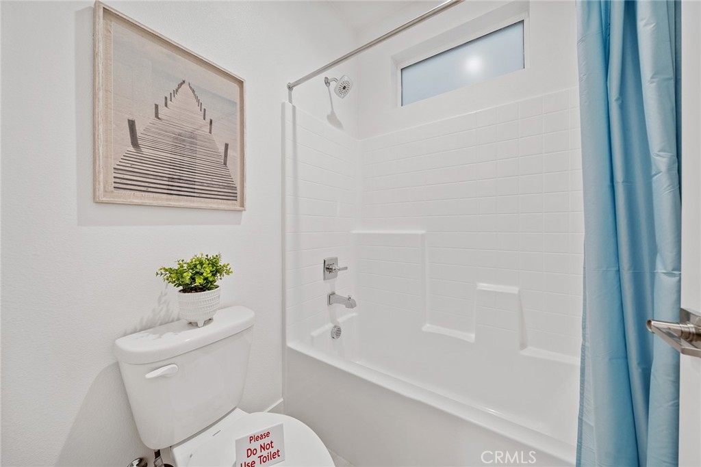 131 Restore Irvine, CA 92618 - Photo 18 of 43 a white toilet sitting next to a bath tub