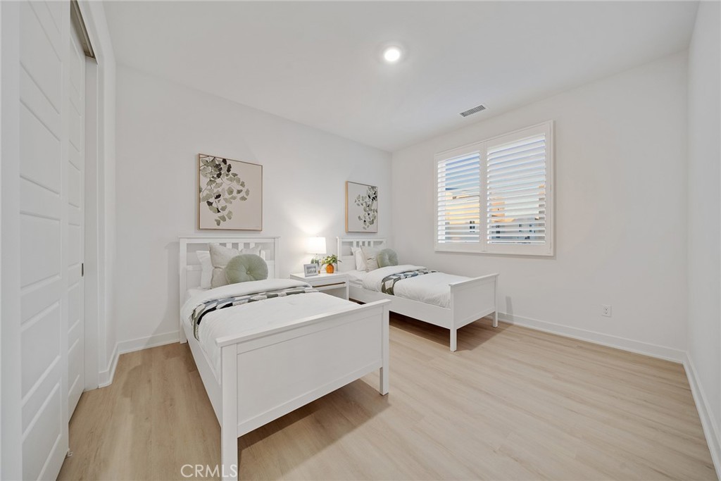 131 Restore Irvine, CA 92618 - Photo 19 of 43 a living room with furniture and a window