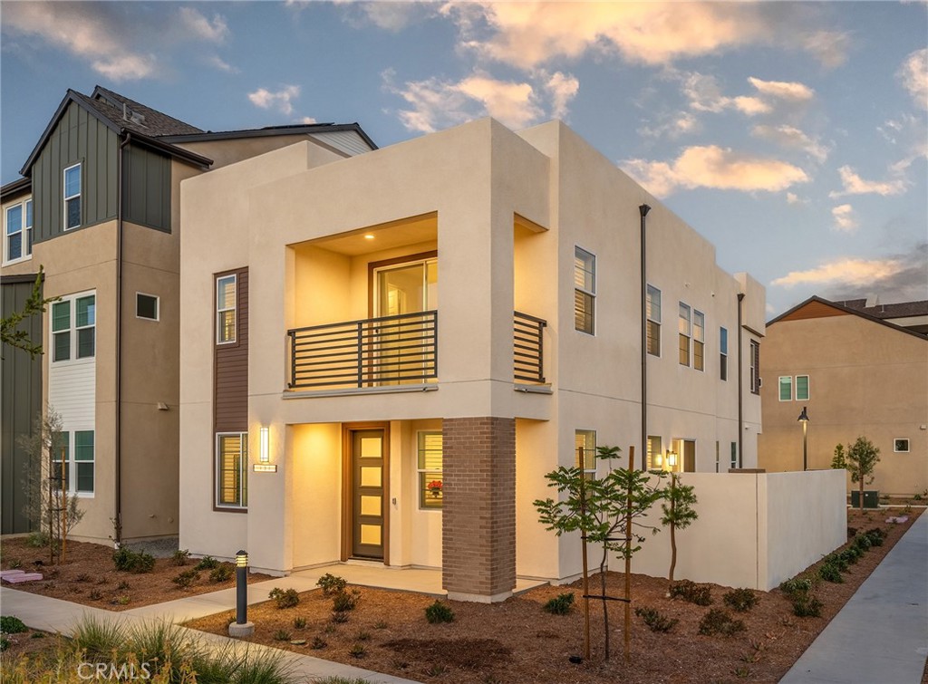 131 Restore Irvine, CA 92618 - Photo 2 of 43 a front view of a house with many windows