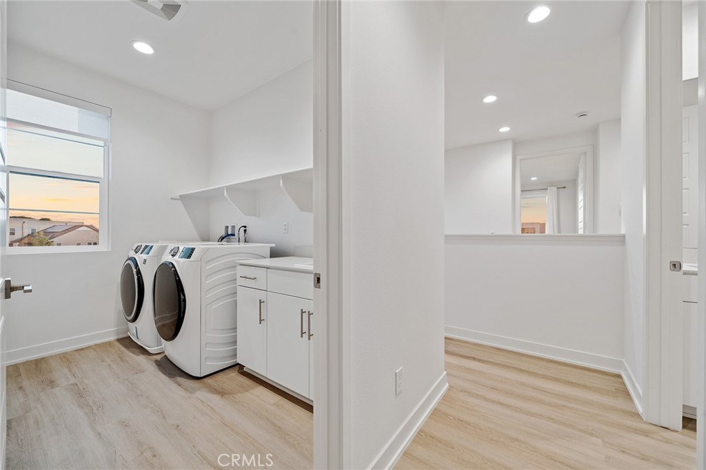 131 Restore Irvine, CA 92618 - Photo 23 of 43 a utility room with dryer and washer