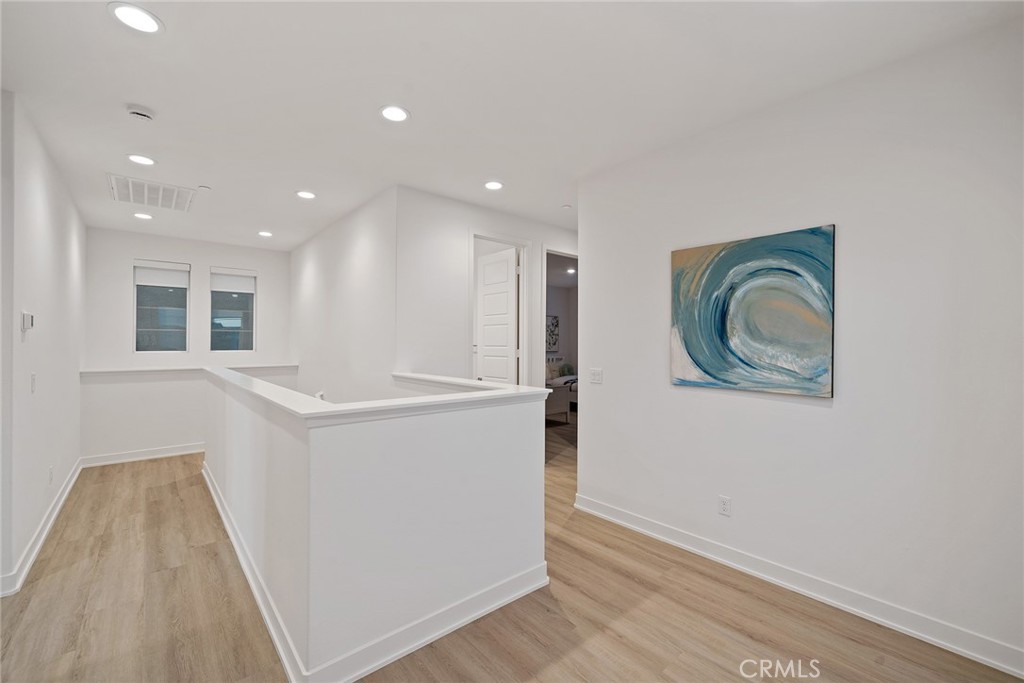 131 Restore Irvine, CA 92618 - Photo 26 of 43 a view of entryway with wooden floor
