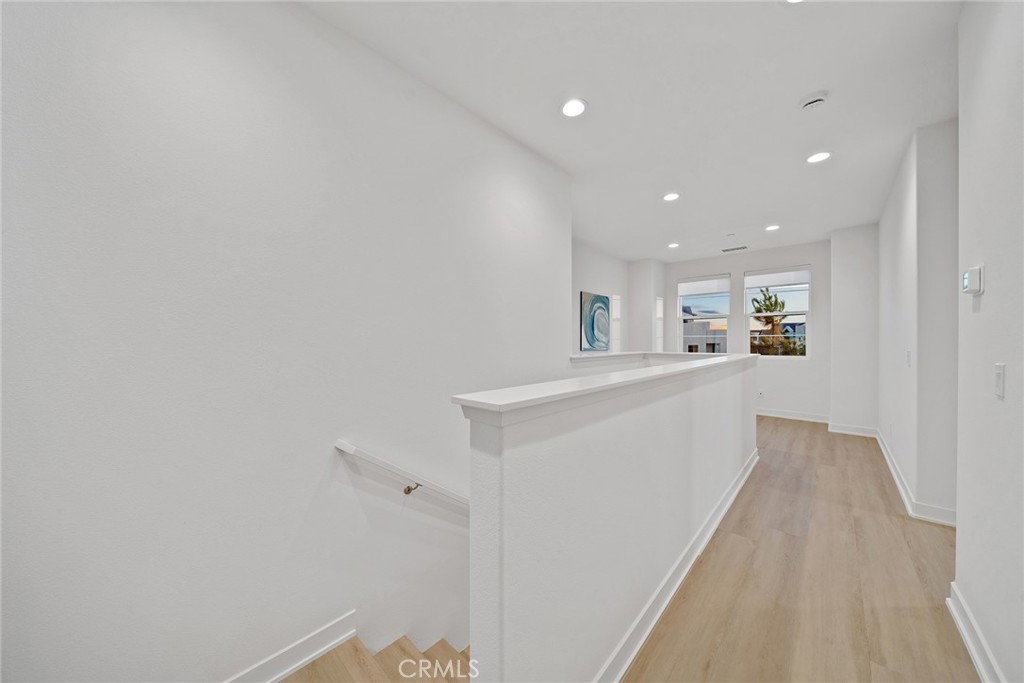 131 Restore Irvine, CA 92618 - Photo 27 of 43 a view of a kitchen with an empty space and a window
