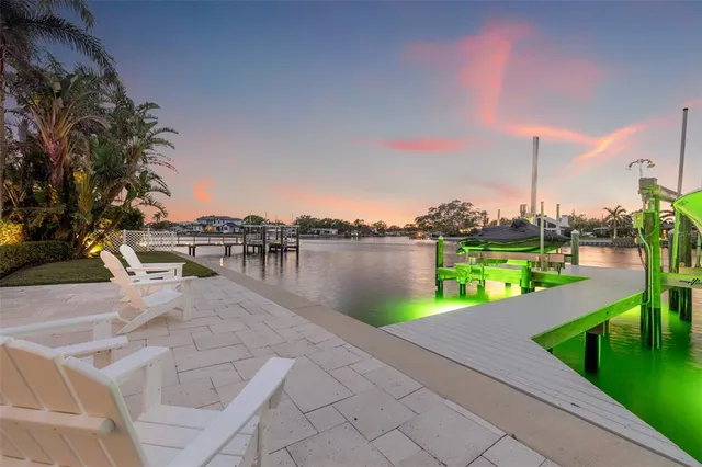 a spacious bathroom with a granite countertop sink mirror and a