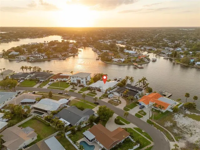 a view of washer and dryer with kitchen in the background