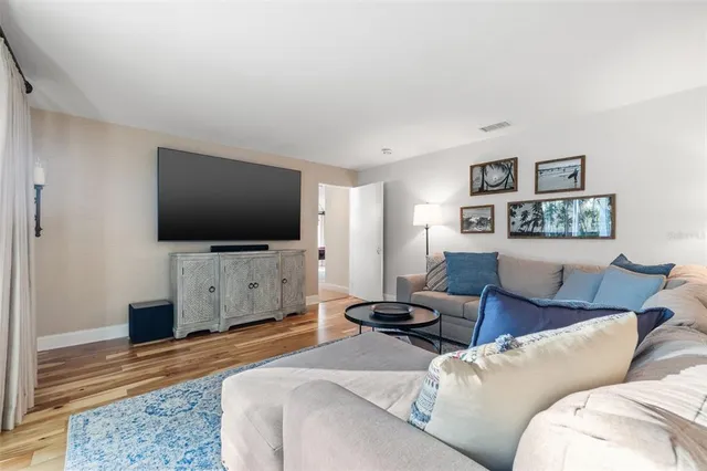 a view of swimming pool with outdoor seating and yard