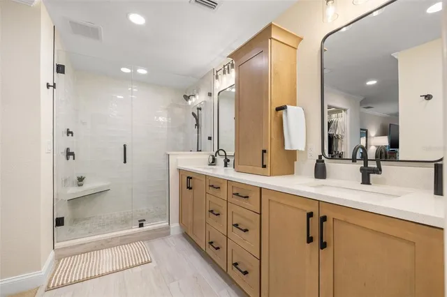 a view of a house with a yard and garage