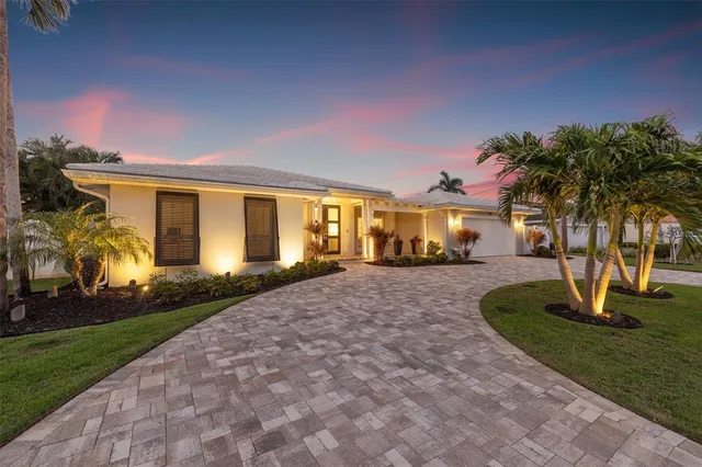 a view of swimming pool with outdoor seating