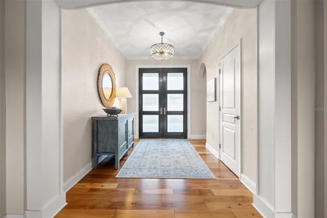 a kitchen with a sink and a large window
