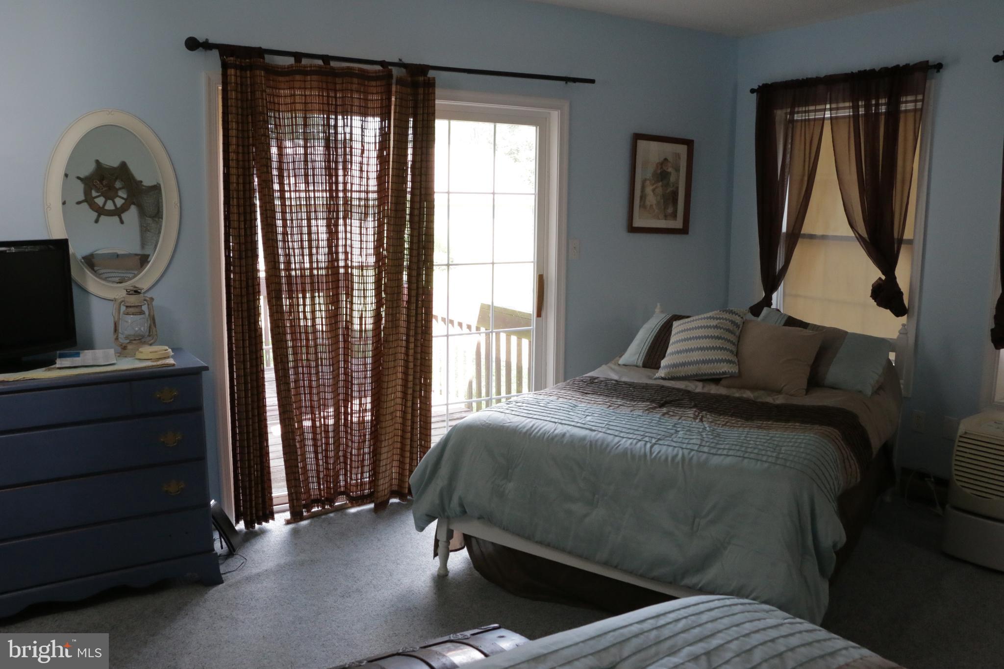36666 Clubhouse Road Ocean View, DE 19970 - Photo 3 of 18 1st floor room with two beds, great for guest