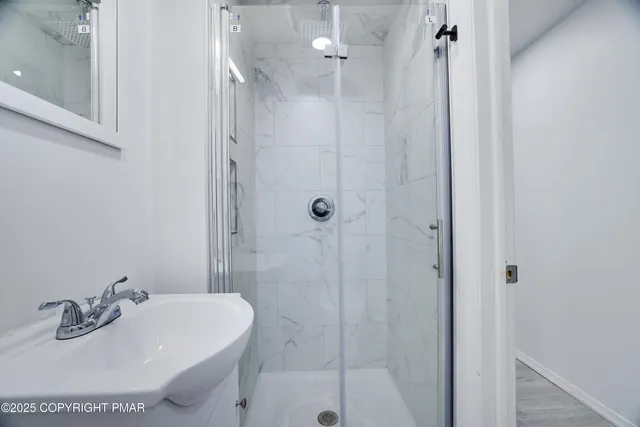 a hallway with wooden floor