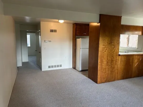 a kitchen with a stove and a sink
