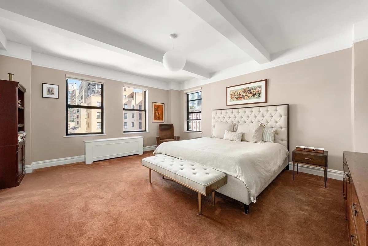 277 West End Avenue, Unit 12MA Manhattan, NY 10023 - Photo 6 of 12 a bedroom with a large bed and a tv