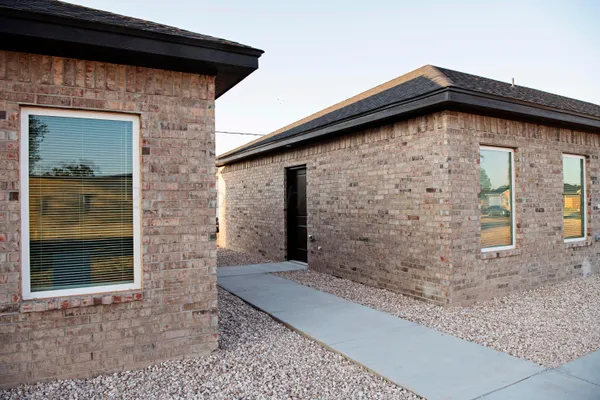a front view of a house with windows