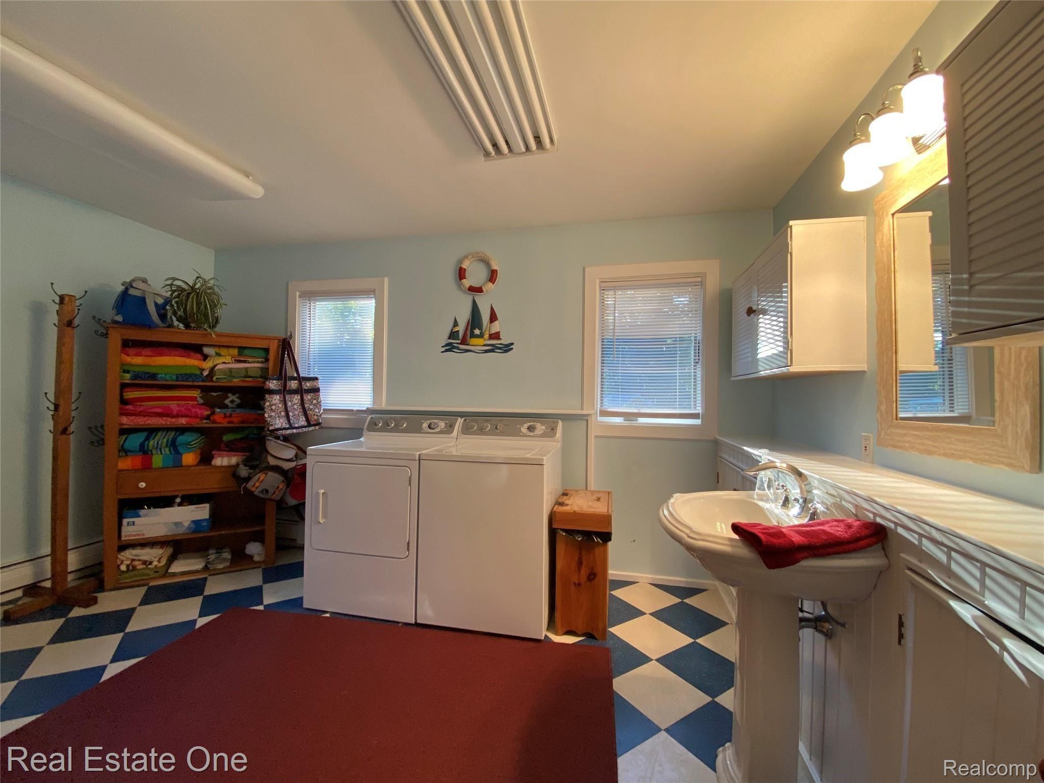 2722 Piney Ridge Road Ludington, MI 49431 - Photo 48 of 64 Large, Convenient combo bath/laundry room