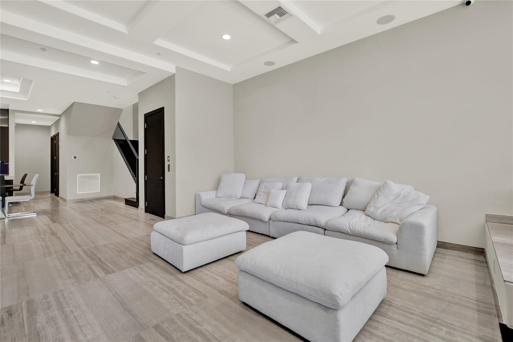 425 North Ocean Boulevard, Unit 3 Boca Raton, FL 33432 - Photo 18 of 69 a living room with furniture and a wooden floor