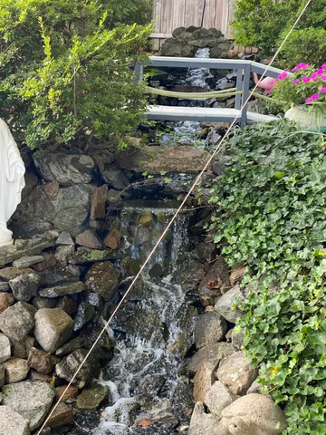 a backyard of a house with lots of green space