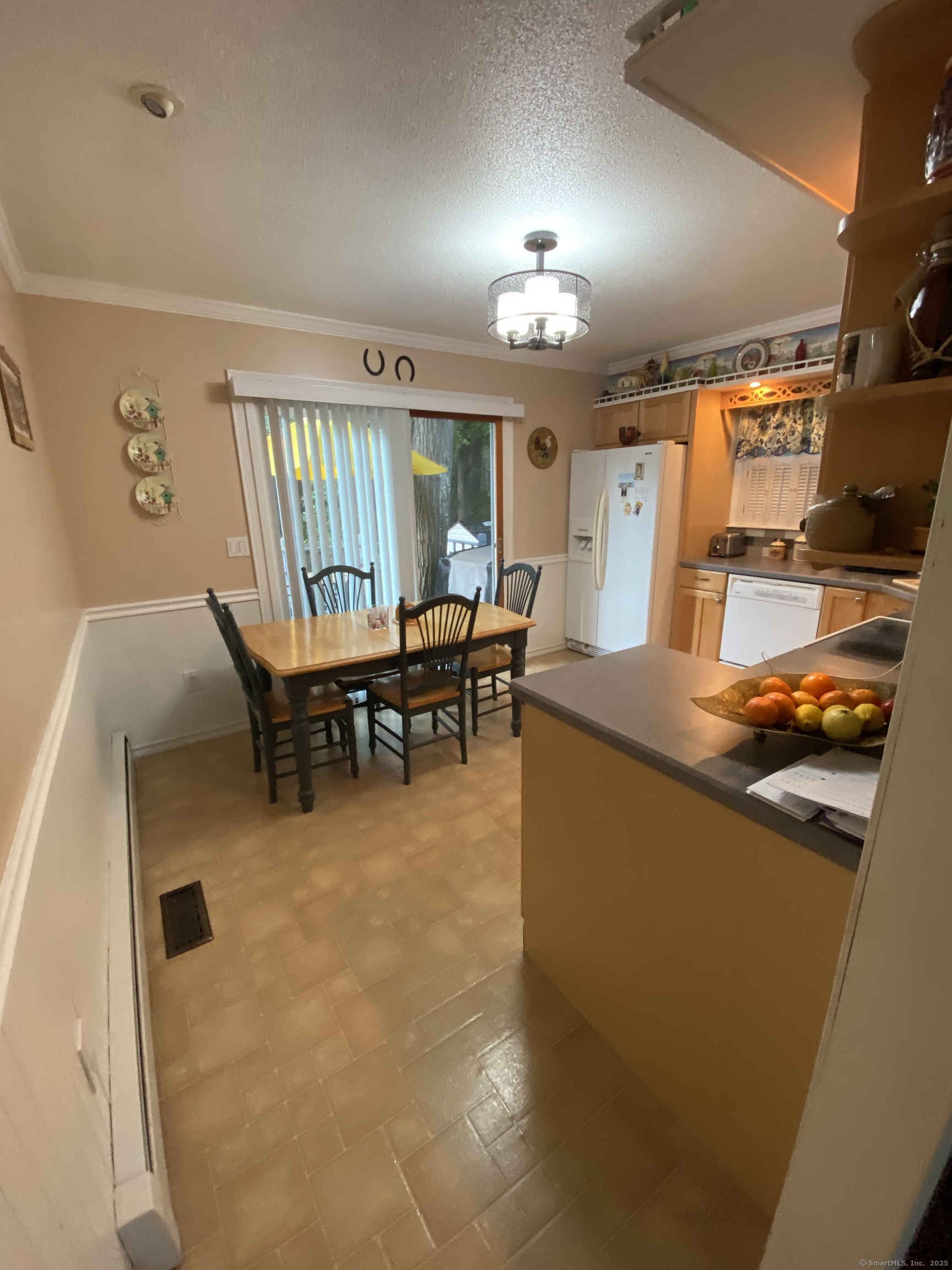 110 Wooster Avenue Waterbury, CT 06708 - Photo 21 of 35 a dining room with furniture and chandelier