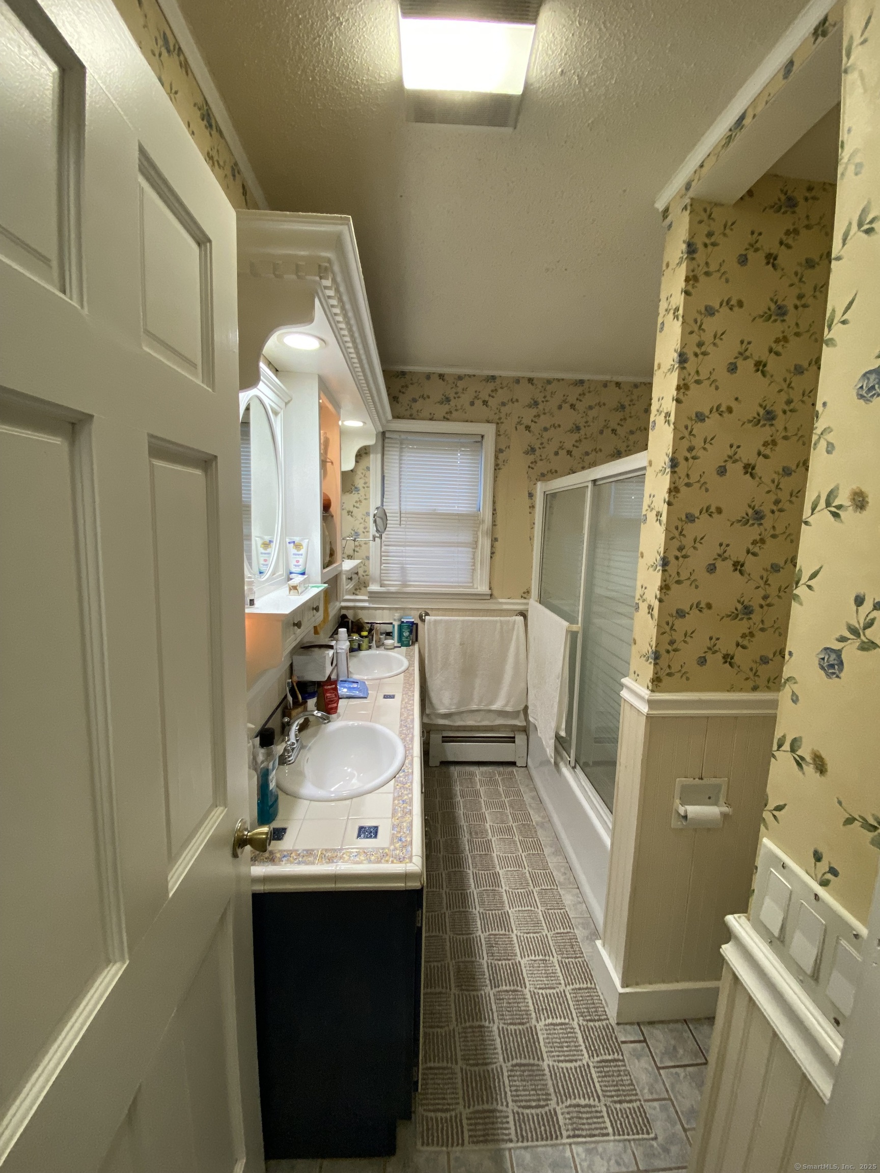 110 Wooster Avenue Waterbury, CT 06708 - Photo 27 of 35 a bathroom with a sink toilet and shower