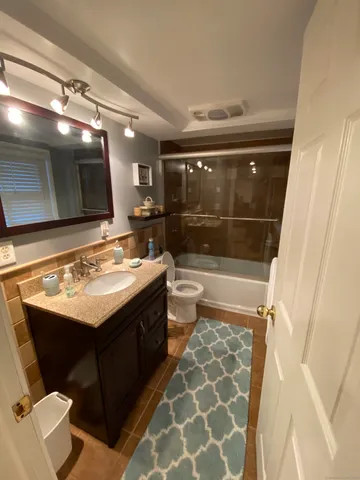 a bathroom with a sink and a toilet