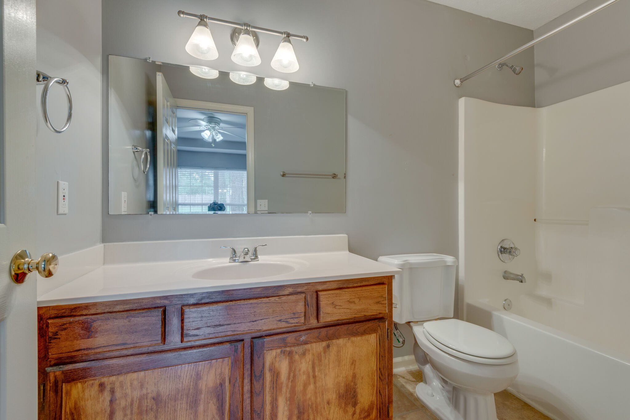 7325 Matthew Street Fairview, TN 37062 - Photo 14 of 27 a bathroom with a sink toilet and shower