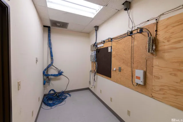 a room with furniture and flat screen tv