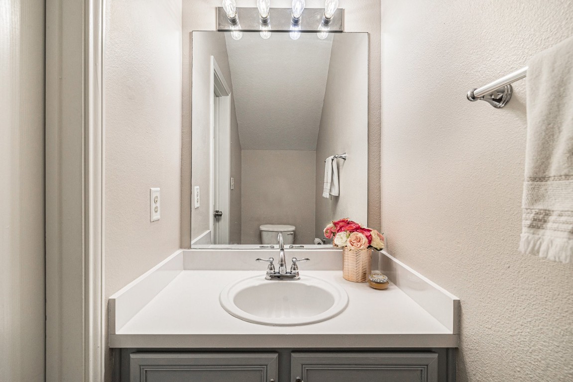 23644 Wildwood Green Way Spring, TX 77373 - Photo 11 of 25 Clean, bright, and perfect for guests—this downstairs half bath is tucked away just off the main living space.