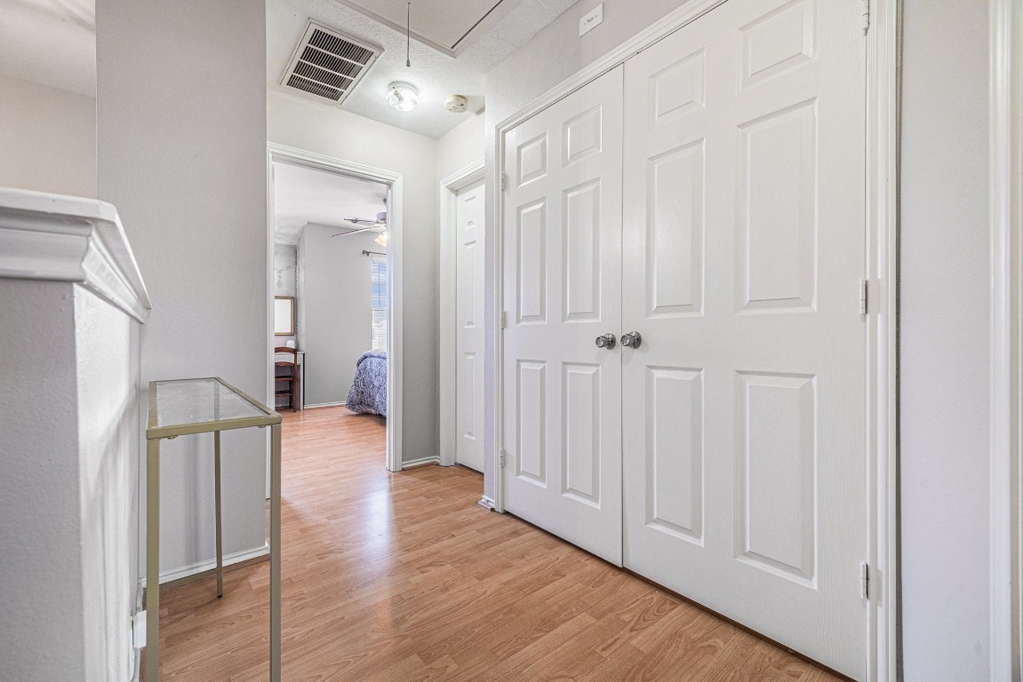 23644 Wildwood Green Way Spring, TX 77373 - Photo 12 of 25 Upstairs offers easy access to all bedrooms plus a convenient laundry nook—everything right where you need it.