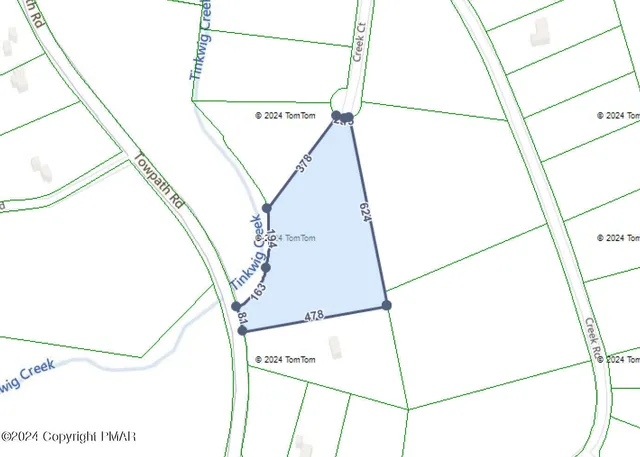 a view of an house with backyard outdoor seating and lake view