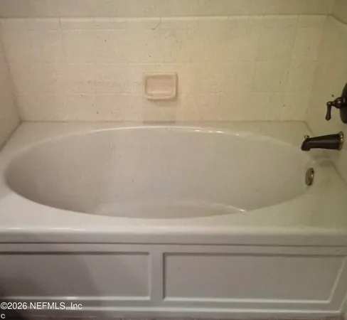 a bathroom with a bathtub