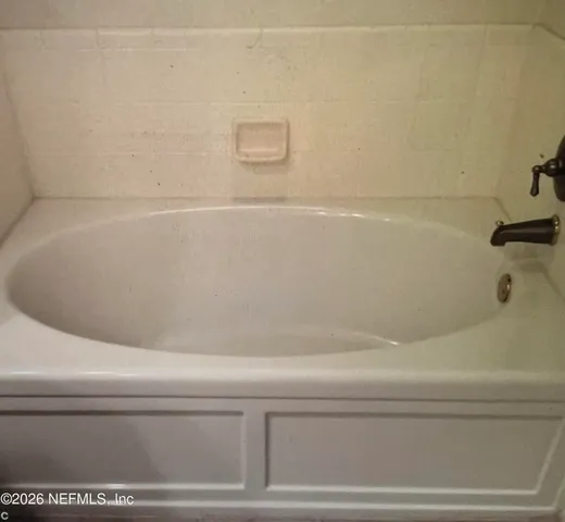 a bathroom with a bathtub