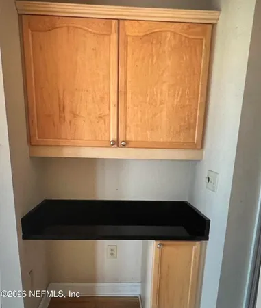 a view of a room with racks on the wall