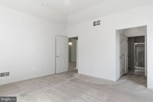 a bathroom with a sink double vanity and a mirror