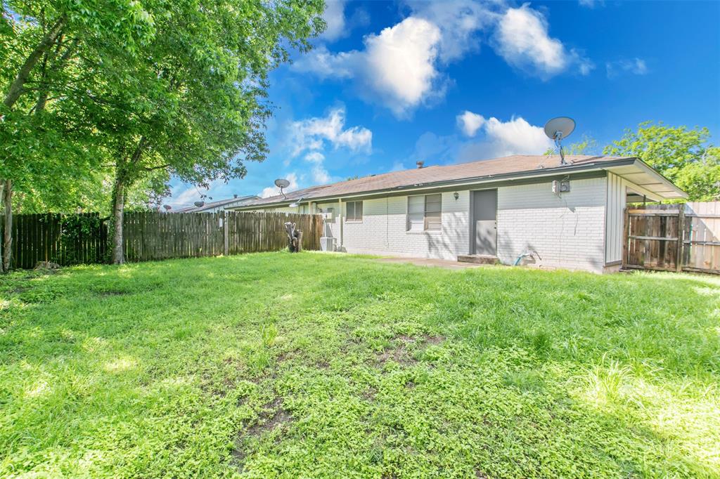 600-614 Riggins Street Robinson, TX 76706 - Photo 16 of 16 a view of house with backyard
