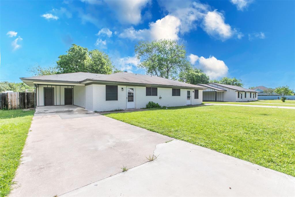 600-614 Riggins Street Robinson, TX 76706 - Photo 2 of 16 a view of a house with a yard and sitting area