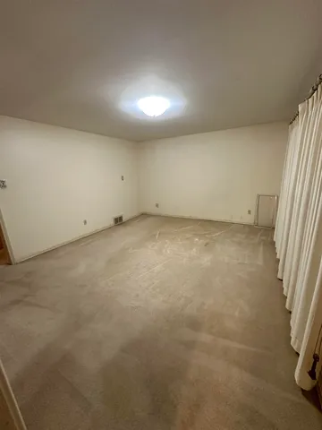 an empty room with a window