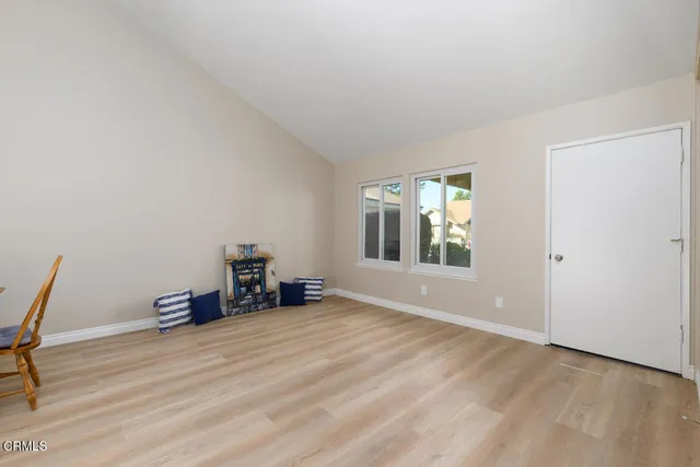 a view of room with furniture and a window