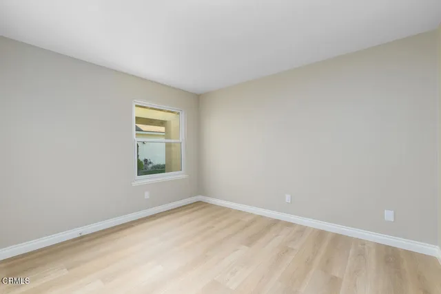 a view of a room with a window