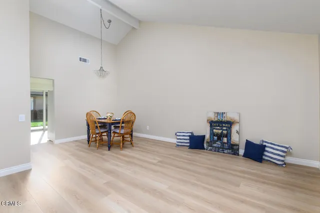 a view of a workspace with furniture