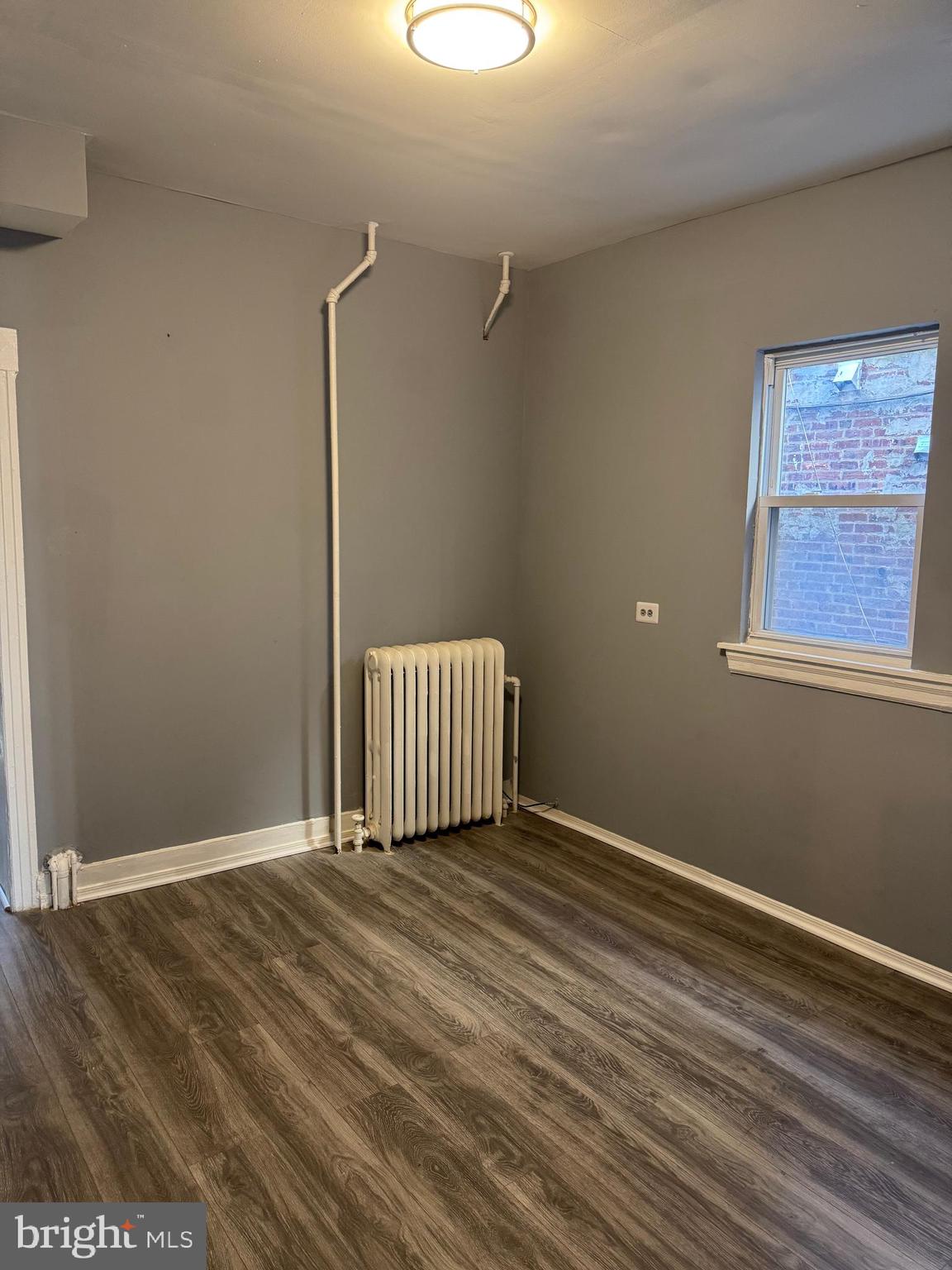 36 North Hartford Avenue Atlantic City, NJ 08401 - Photo 7 of 8 a view of a room with wooden floor
