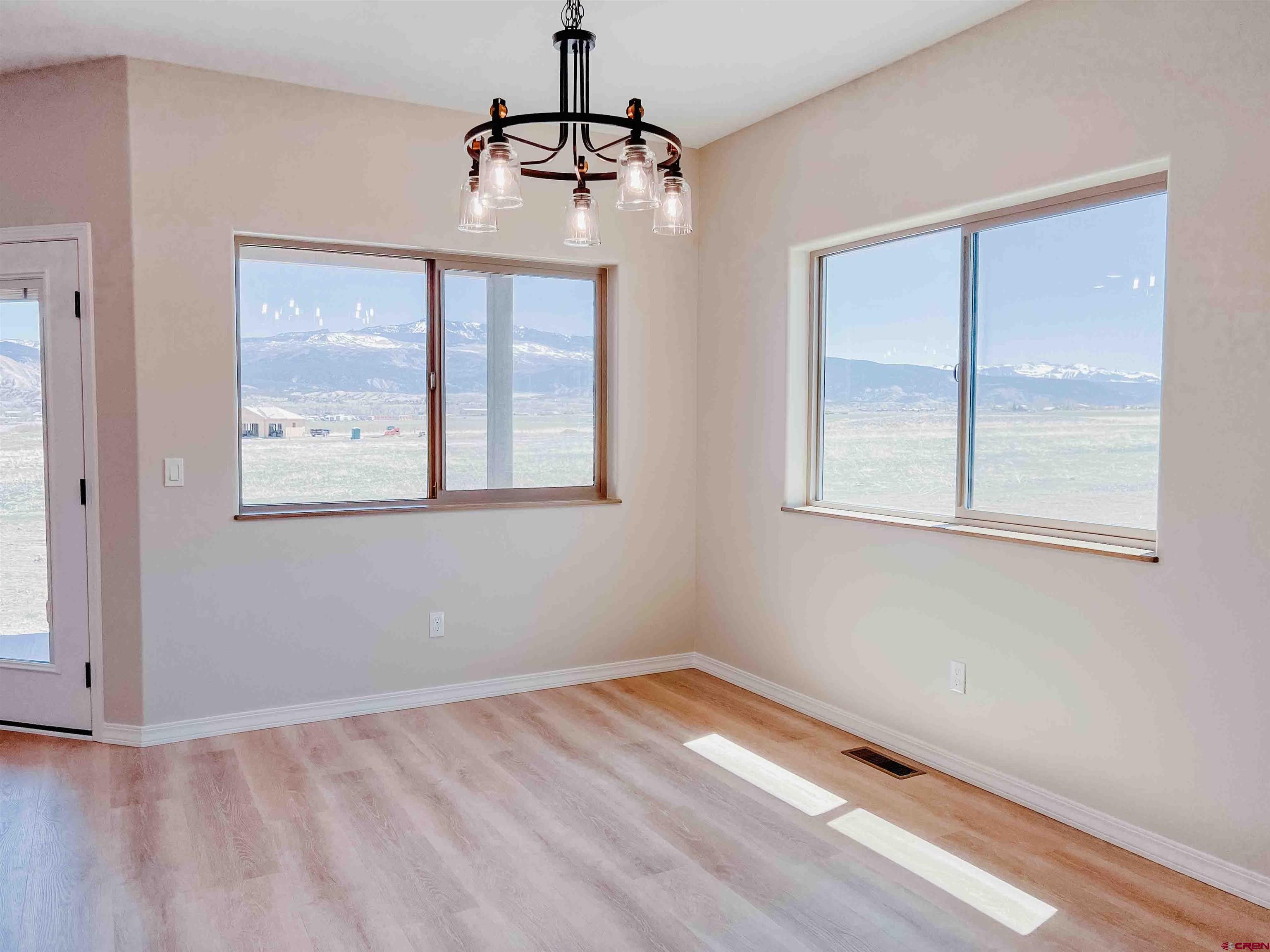 68364 Vernal Road Montrose, CO 81403 - Photo 9 of 11 a view of an empty room with a window