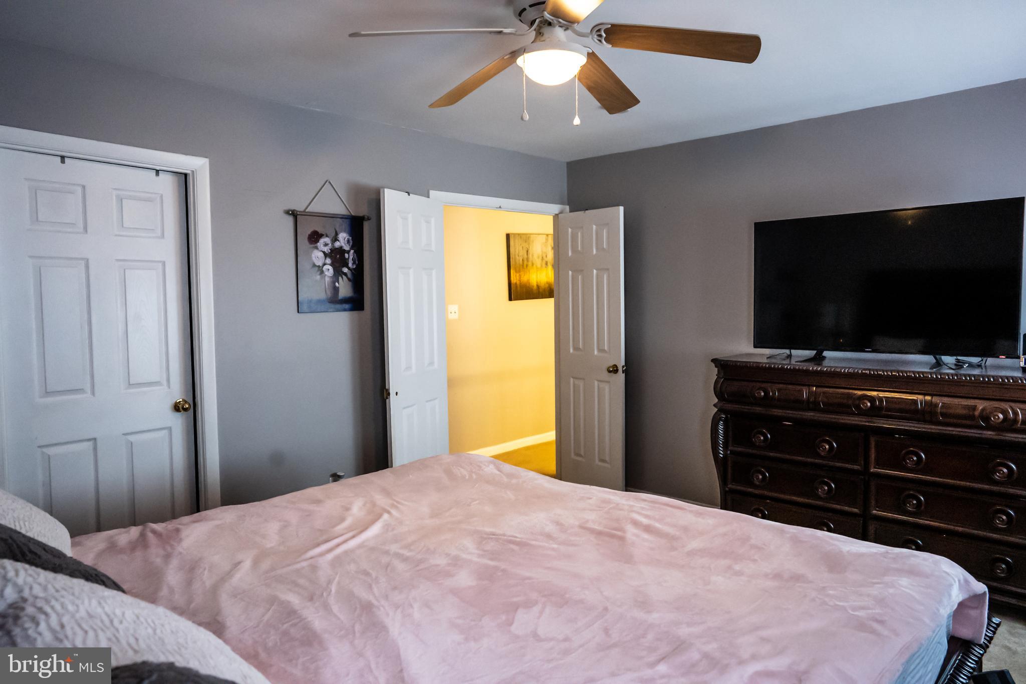 8511 Jenner Court Springfield, VA 22153 - Photo 14 of 33 Primary Bedroom with french door entrance