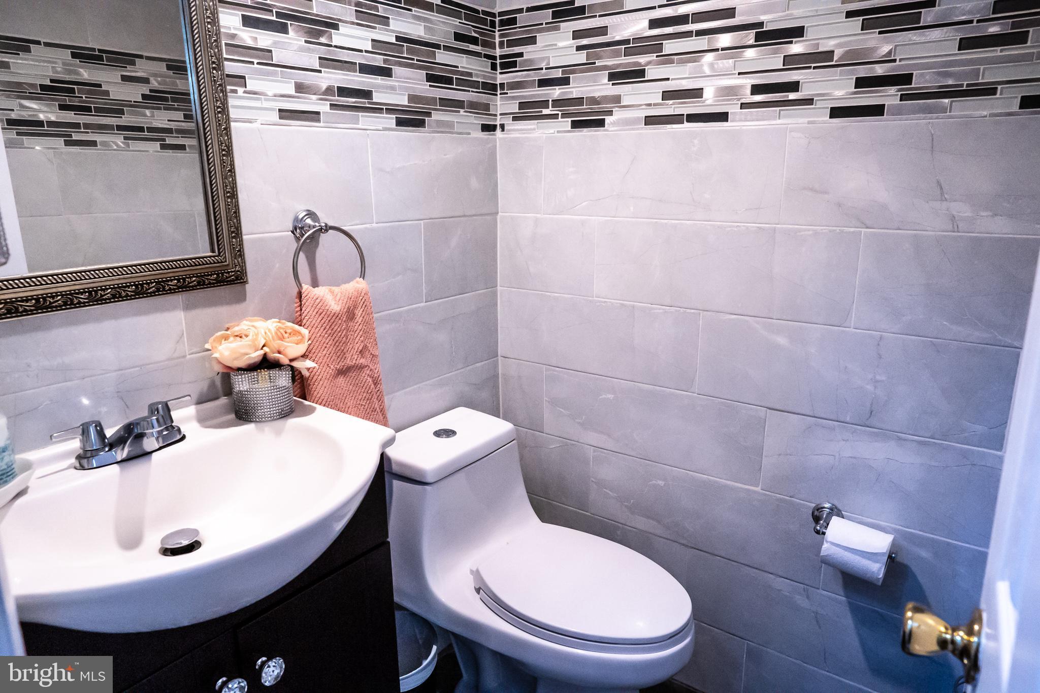 8511 Jenner Court Springfield, VA 22153 - Photo 21 of 33 Half Bath at the main level