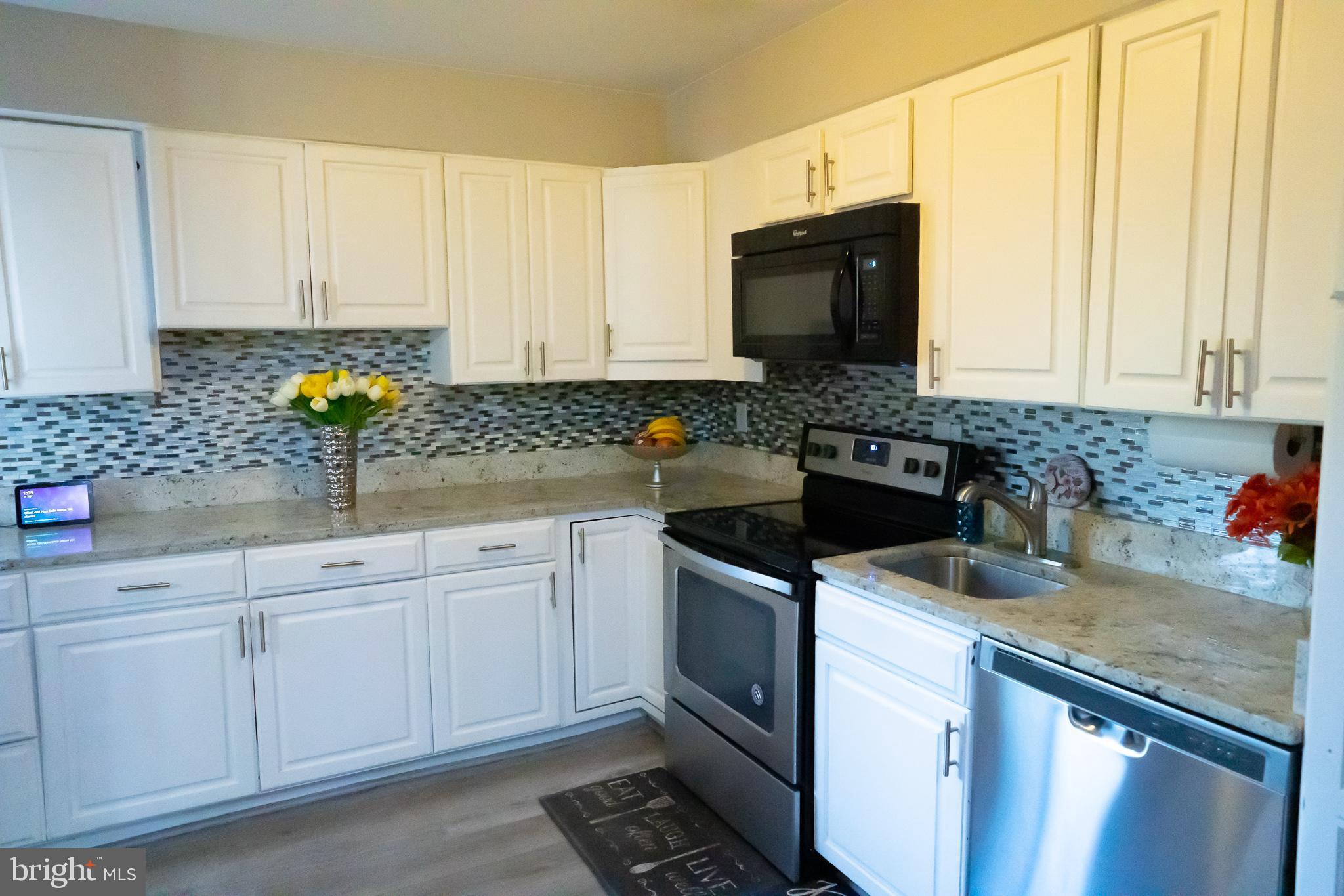 8511 Jenner Court Springfield, VA 22153 - Photo 6 of 33 Spacious Kitchen w/ SS appliances