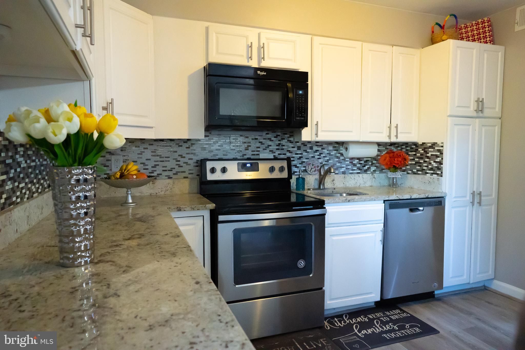 8511 Jenner Court Springfield, VA 22153 - Photo 8 of 33 White cabinets with SS Appliances
