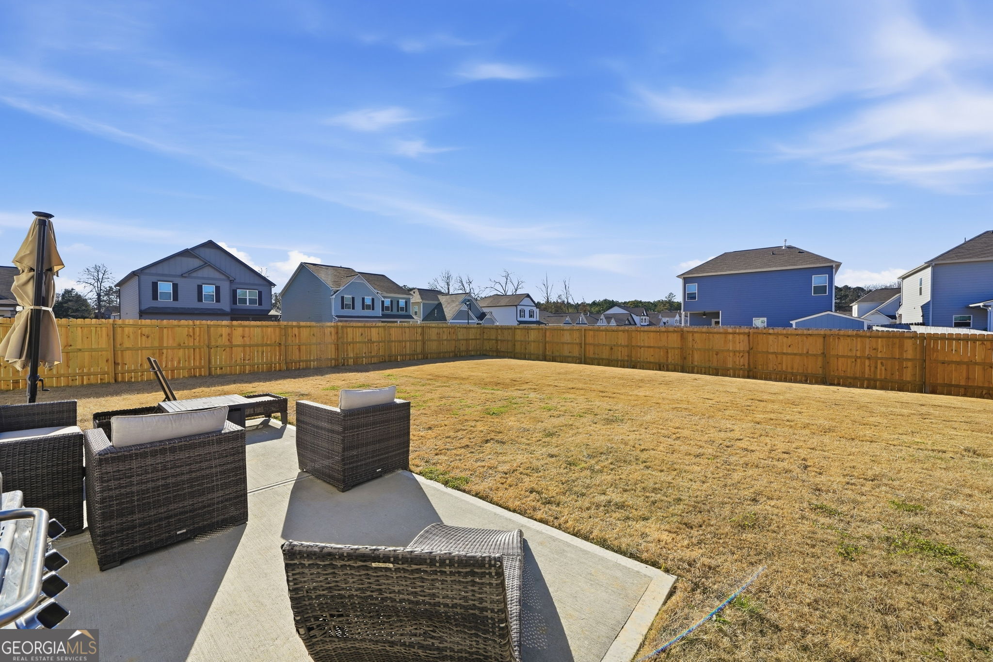 199 Graham Circle Adairsville, GA 30103 - Photo 2 of 49 a view of swimming pool with outdoor seating and yard in back