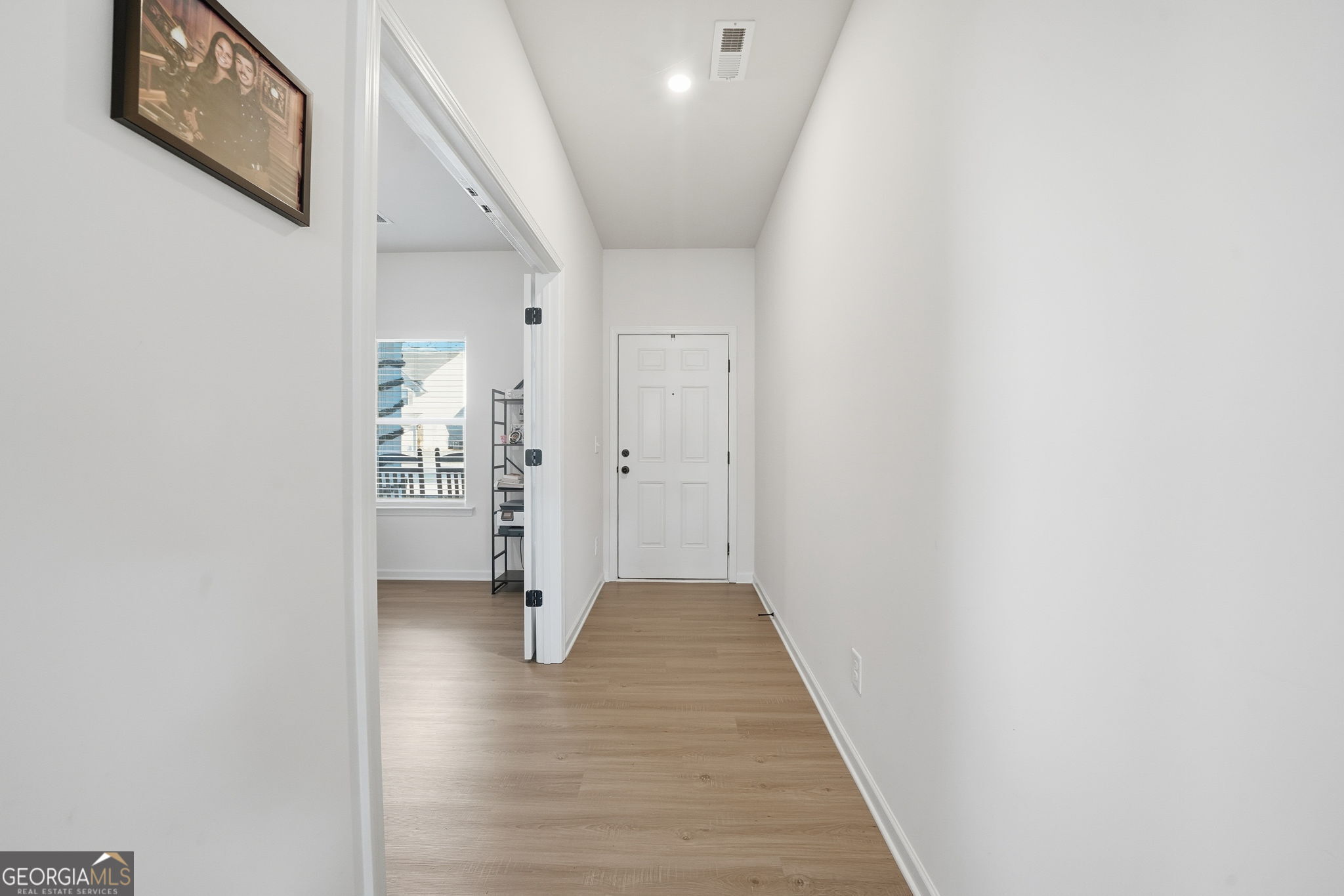 199 Graham Circle Adairsville, GA 30103 - Photo 21 of 49 a view of a hallway with wooden floor and closet