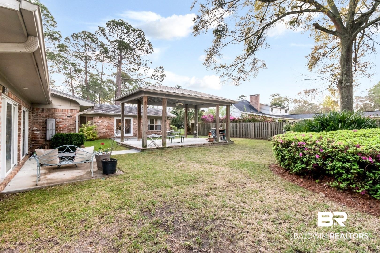 154 Fenwick Road Mobile, AL 36608 - Photo 39 of 48 Fenced backyard featuring a patio and a gazebo
